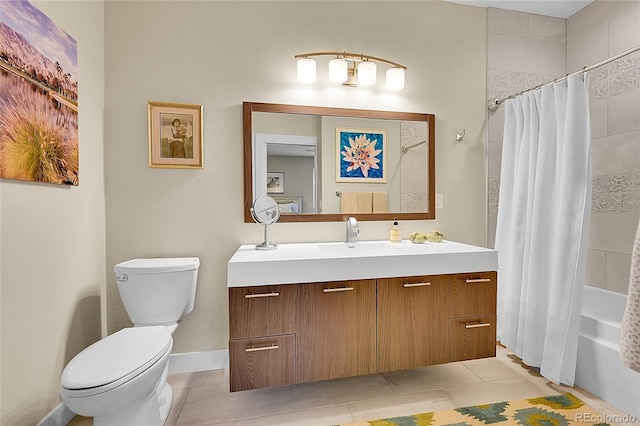 full bathroom featuring tile patterned flooring, vanity, toilet, and shower / bath combo with shower curtain