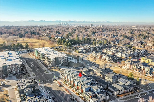 birds eye view of property with a mountain view