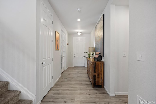 hallway featuring light hardwood / wood-style flooring