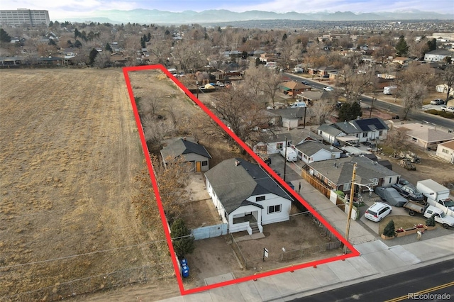 drone / aerial view featuring a mountain view