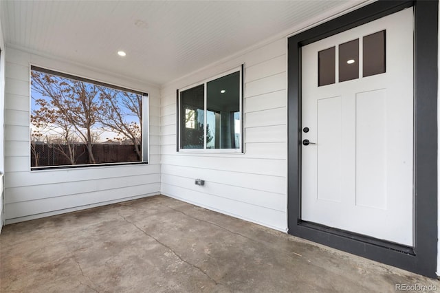 exterior entry at dusk with a porch