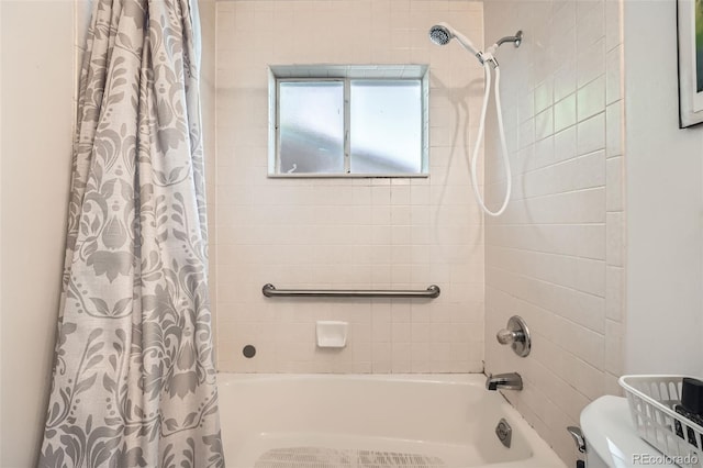 7060 Avrum Dr, Denver, CO 80221 - bathroom with shower / tub combo and toilet