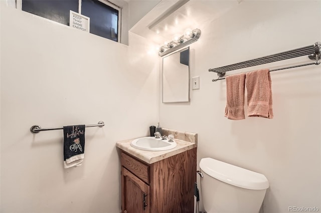 7060 Avrum Dr, Denver, CO 80221 - half bathroom featuring vanity and toilet