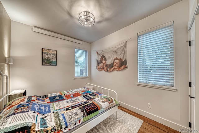 822 Yale Ave, Buena Vista, CO 81211 - bedroom featuring wood finished floors and baseboards