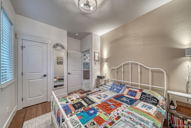 822 Yale Ave, Buena Vista, CO 81211 - bedroom with wood finished floors and baseboards