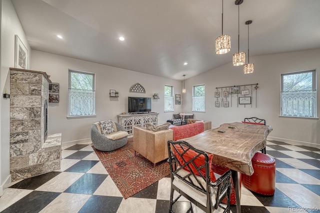 822 Yale Ave, Buena Vista, CO 81211 - dining space featuring plenty of natural light, baseboards, recessed lighting, dark floors, and vaulted ceiling