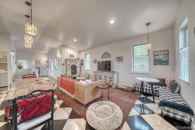 822 Yale Ave, Buena Vista, CO 81211 - living room with a chandelier, plenty of natural light, a fireplace, recessed lighting, and lofted ceiling