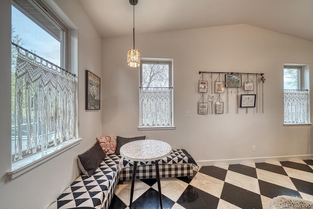 822 Yale Ave, Buena Vista, CO 81211 - living area with vaulted ceiling, a chandelier, baseboards, and tile patterned floors