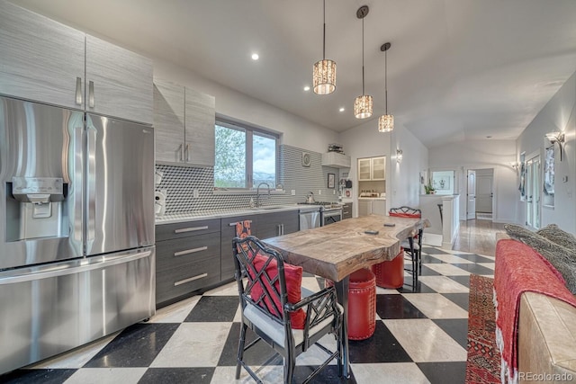 822 Yale Ave, Buena Vista, CO 81211 - kitchen with stainless steel appliances, gray cabinetry, a sink, tasteful backsplash, and light floors
