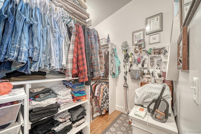 822 Yale Ave, Buena Vista, CO 81211 - walk in closet featuring wood finished floors
