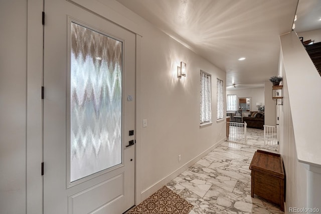 822 Yale Ave, Buena Vista, CO 81211 - entryway with light marble finish floors, recessed lighting, and baseboards