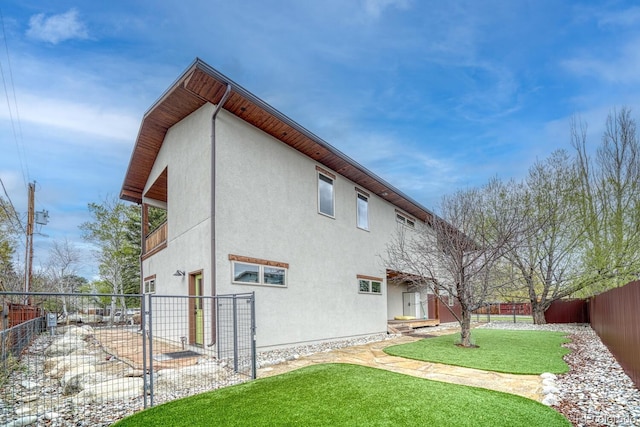 822 Yale Ave, Buena Vista, CO 81211 - view of side of home featuring stucco siding