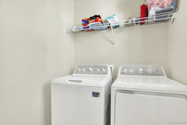 11205 W 53rd Ln, Arvada, CO 80002 - clothes washing area featuring washing machine and clothes dryer