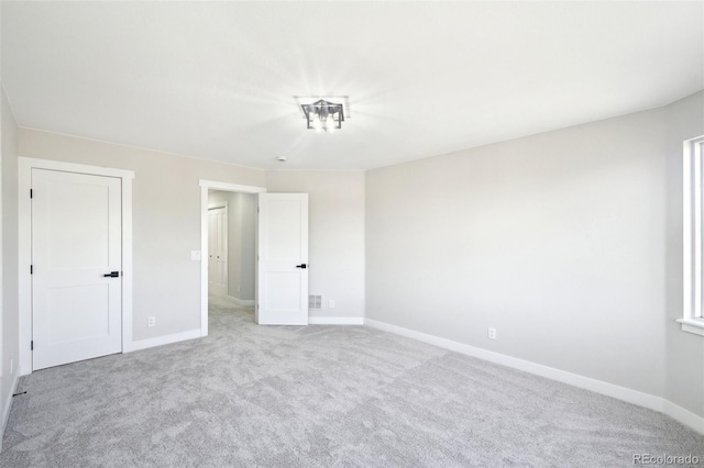 5352 Brookside Dr, Broomfield, CO 80020 - unfurnished bedroom with baseboards and light carpet