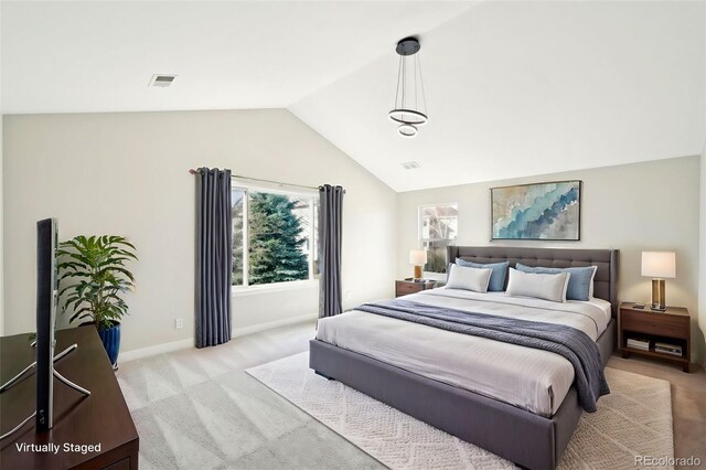 5352 Brookside Dr, Broomfield, CO 80020 - bedroom with light colored carpet, lofted ceiling, and baseboards
