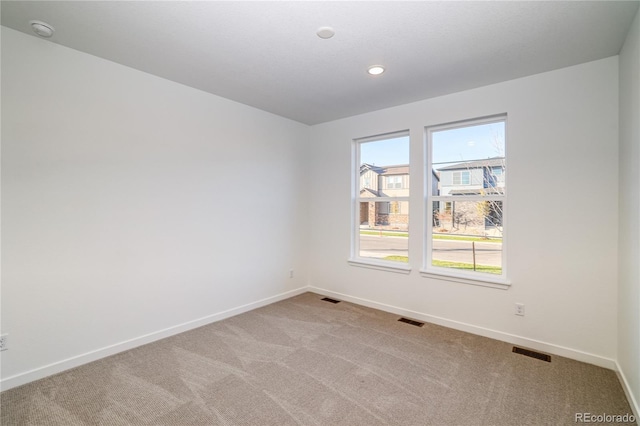 empty room featuring carpet