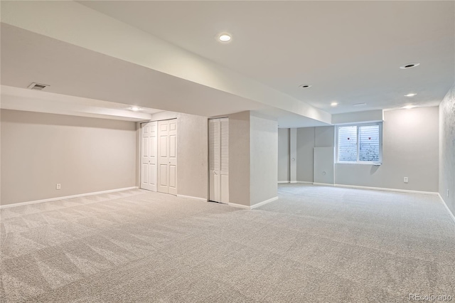 basement with light carpet