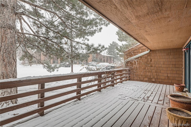 view of snow covered deck