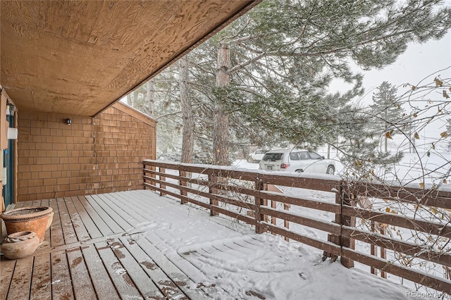 view of snow covered deck