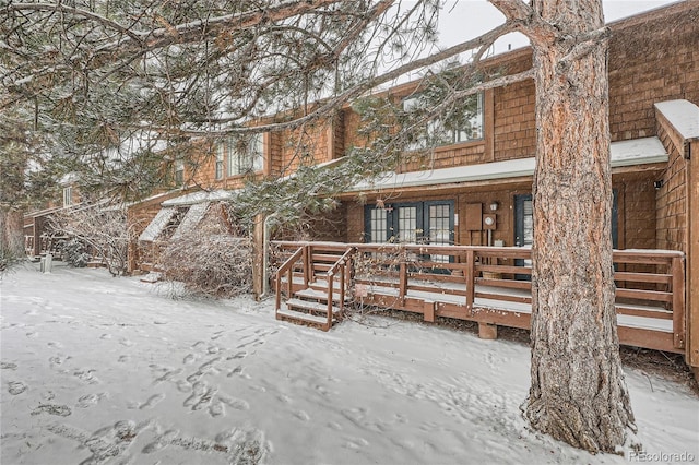 view of snow covered property