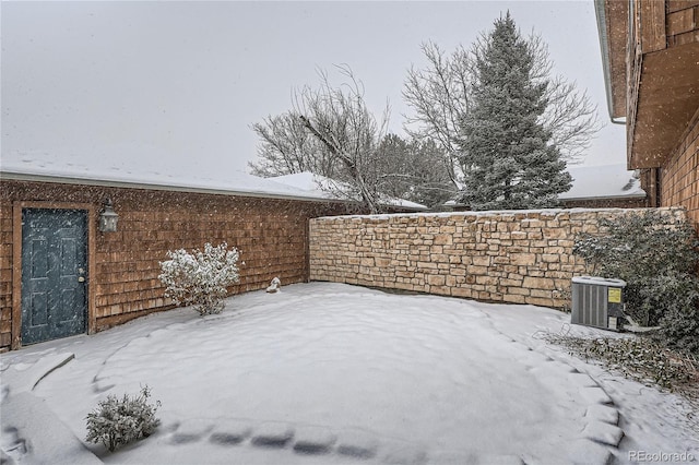 snowy yard with cooling unit