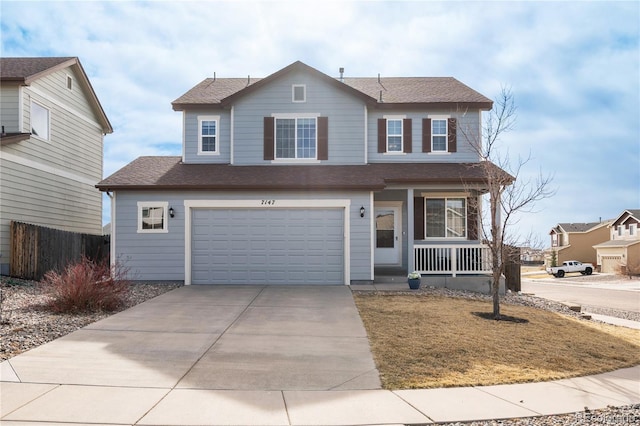 traditional-style home with fence, roof with shingles, covered porch, concrete driveway, and a garage