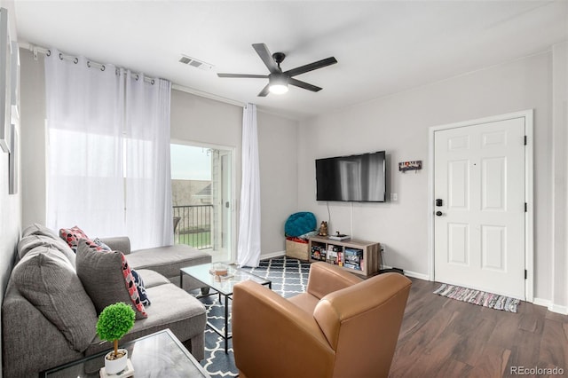 4451 S Ammons St Unit 5-307, Littleton, CO 80123 - living room with baseboards, ceiling fan, wood finished floors, and visible vents