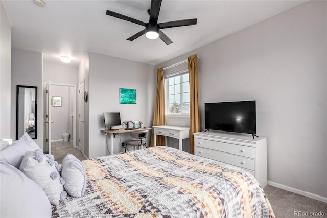 4451 S Ammons St Unit 5-307, Littleton, CO 80123 - bedroom with ceiling fan, baseboards, ensuite bathroom, and carpet floors