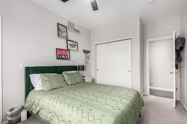 4451 S Ammons St Unit 5-307, Littleton, CO 80123 - bedroom featuring baseboards, carpet, ceiling fan, and a closet