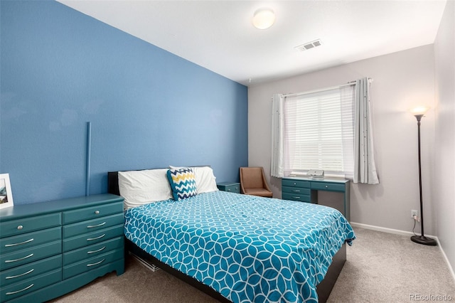 4451 S Ammons St Unit 5-307, Littleton, CO 80123 - bedroom featuring visible vents, baseboards, and carpet floors