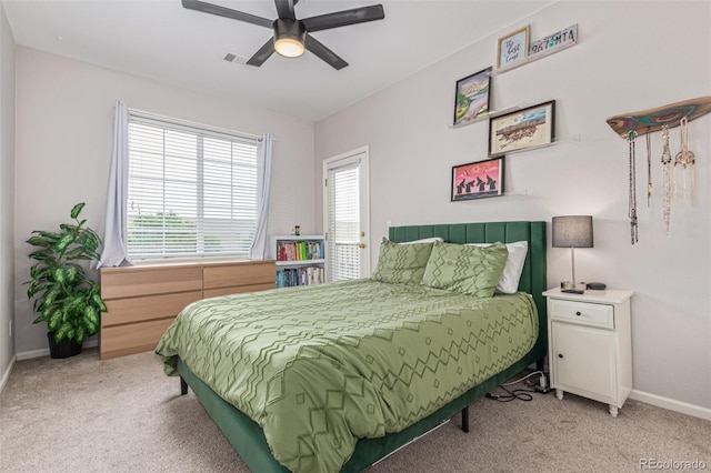 4451 S Ammons St Unit 5-307, Littleton, CO 80123 - bedroom featuring light carpet and a ceiling fan