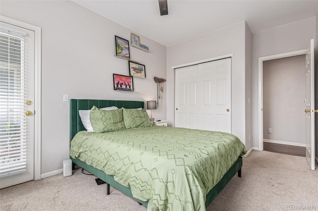 4451 S Ammons St Unit 5-307, Littleton, CO 80123 - carpeted bedroom featuring multiple windows, a ceiling fan, and a closet