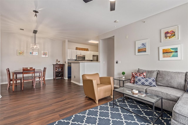 4451 S Ammons St Unit 5-307, Littleton, CO 80123 - living room featuring dark wood-type flooring and a ceiling fan