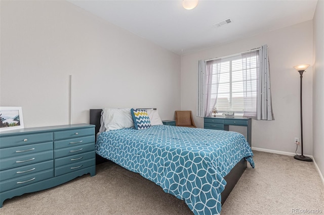4451 S Ammons St Unit 5-307, Littleton, CO 80123 - bedroom featuring carpet floors and baseboards