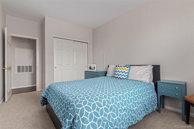 4451 S Ammons St Unit 5-307, Littleton, CO 80123 - bedroom with carpet floors and a closet