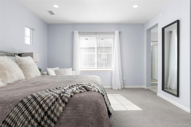 carpeted bedroom featuring recessed lighting, visible vents, and baseboards