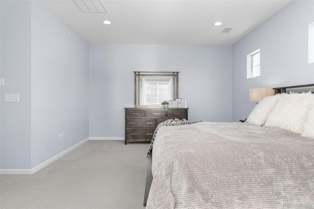 bedroom with recessed lighting, light colored carpet, visible vents, and baseboards