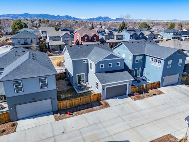 bird's eye view with a mountain view and a residential view