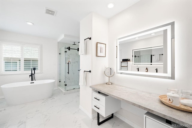 full bathroom featuring visible vents, a freestanding bath, recessed lighting, a marble finish shower, and marble finish floor