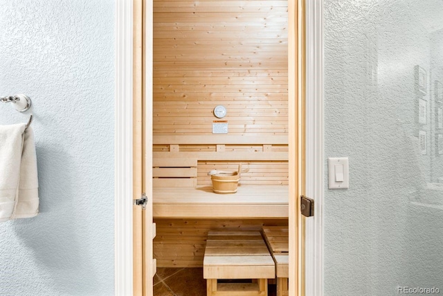 view of sauna with a textured wall