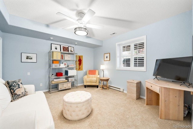 carpeted living room with baseboard heating, baseboards, visible vents, and ceiling fan
