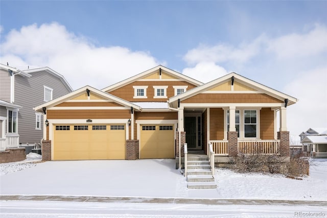 craftsman house featuring a garage and covered porch