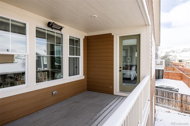 wooden balcony featuring a deck