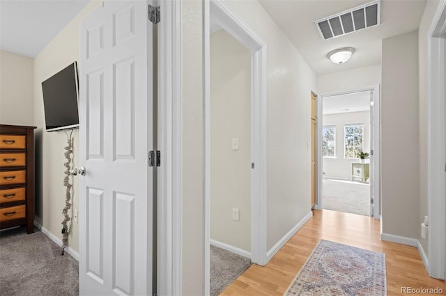 17808 E 104th Pl Unit C, Commerce City, CO 80022 - corridor featuring light wood-type flooring and baseboards