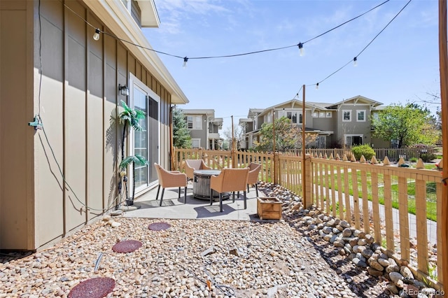 17808 E 104th Pl Unit C, Commerce City, CO 80022 - view of patio featuring a residential view