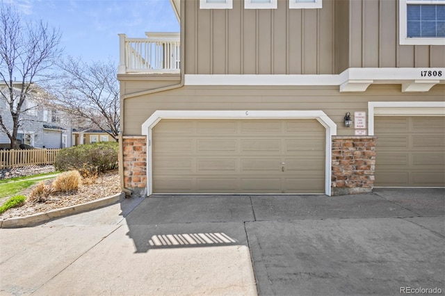17808 E 104th Pl Unit C, Commerce City, CO 80022 - garage featuring driveway