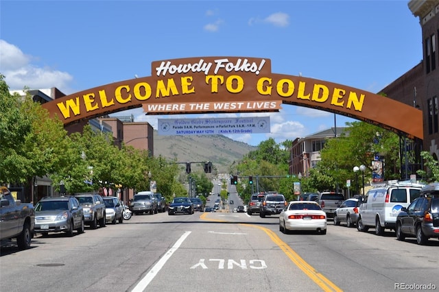 3147 Juniper Ct, Golden, CO 80401 - view of asphalt street with traffic lights and a mountain view