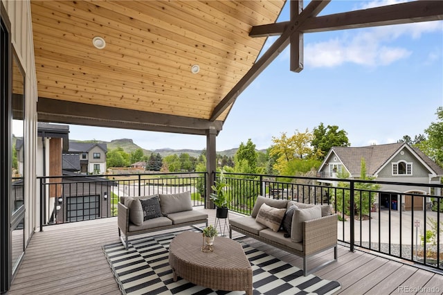 3147 Juniper Ct, Golden, CO 80401 - wooden deck featuring outdoor lounge area and a mountain view