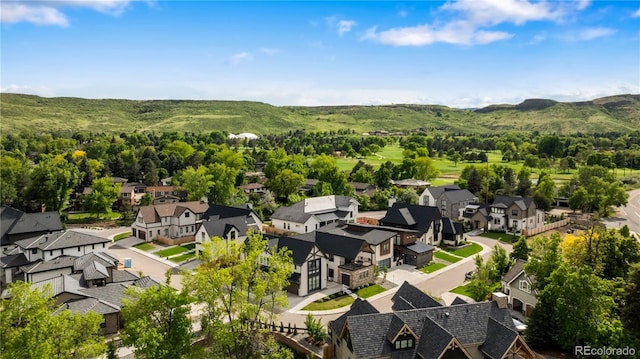 3147 Juniper Ct, Golden, CO 80401 - aerial perspective of suburban area with a mountainous background
