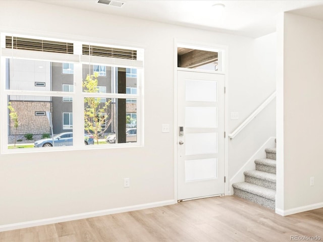 foyer entrance featuring light wood-type flooring